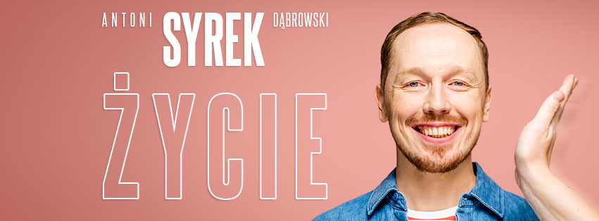 Grafika występu. Na różowym tle po prawej stronie zdjęcie uśmiechnietego mężczyzny. Obok ręka, można podejrzewać, że ktoś próbuje mężczyznę uderzyć w twarz, Po lewej stronie napis: Antoni Syrek Dąbrowski. "Życie".