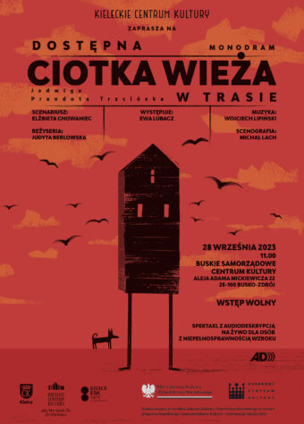 Grafika. Plakat spektaklu. Na czerwonym tle wąski czarny domek ze spadzistym dachem na patyczakowatych, prostych nogach. Obok czarny. pies. Na górze napisy: Kieleckie Centrum Kultury zaprasza na : Dostępna Ciotka Wieża. Monodram w trasie. 28 września 2023 godz. 11 Buskie Samorządowe Centrum Kultury, wstęp wolny. Spektakl z audiodeskrypcją na żywo dla osób z niepełnosprawnością wzroku.